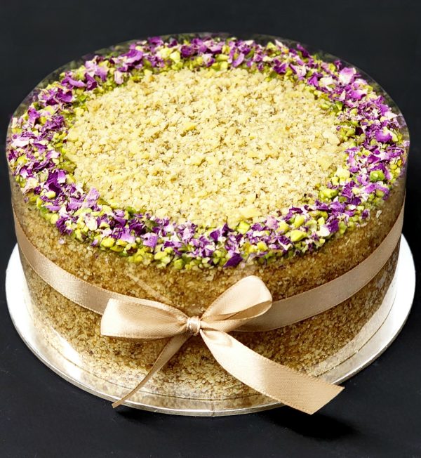 Honey cake with walnuts, pistachios and rose petals