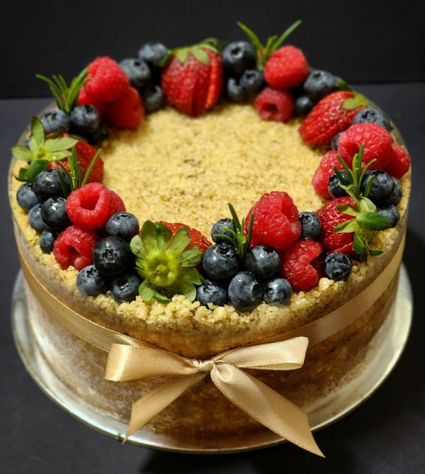Honey cake with walnuts and berries